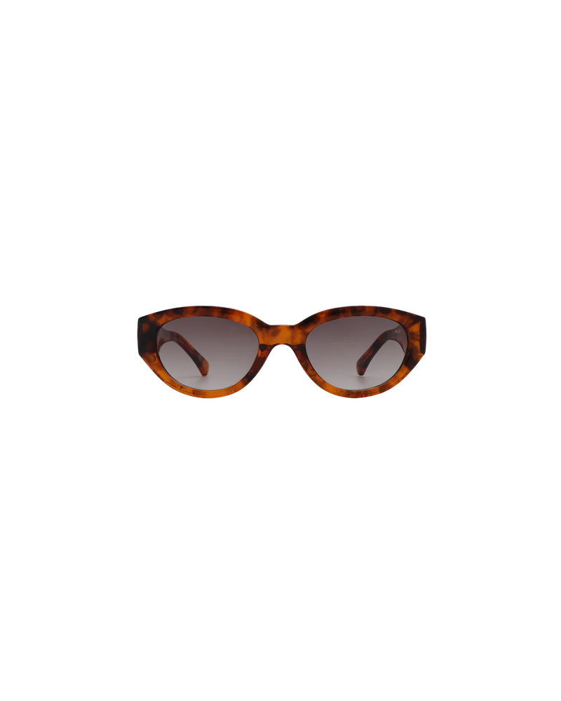 WINNIE SUNGLASS HAVANA | The Winnie by A.Kjaerbede is a futuristic cat eye sunglass with tortoiseshell frames and brown tinted lens.