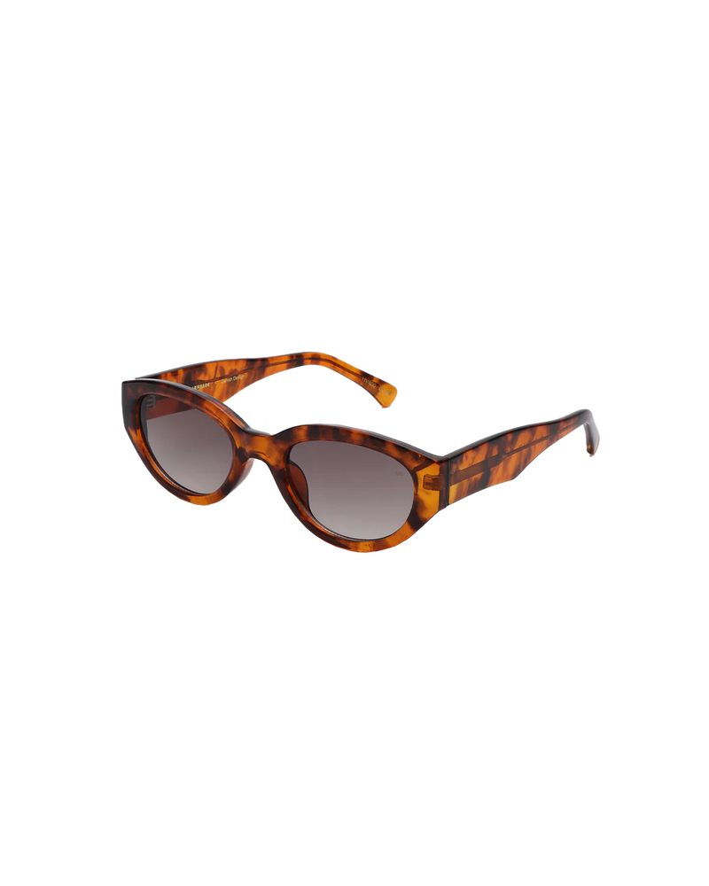 WINNIE SUNGLASS HAVANA | The Winnie by A.Kjaerbede is a futuristic cat eye sunglass with tortoiseshell frames and brown tinted lens.