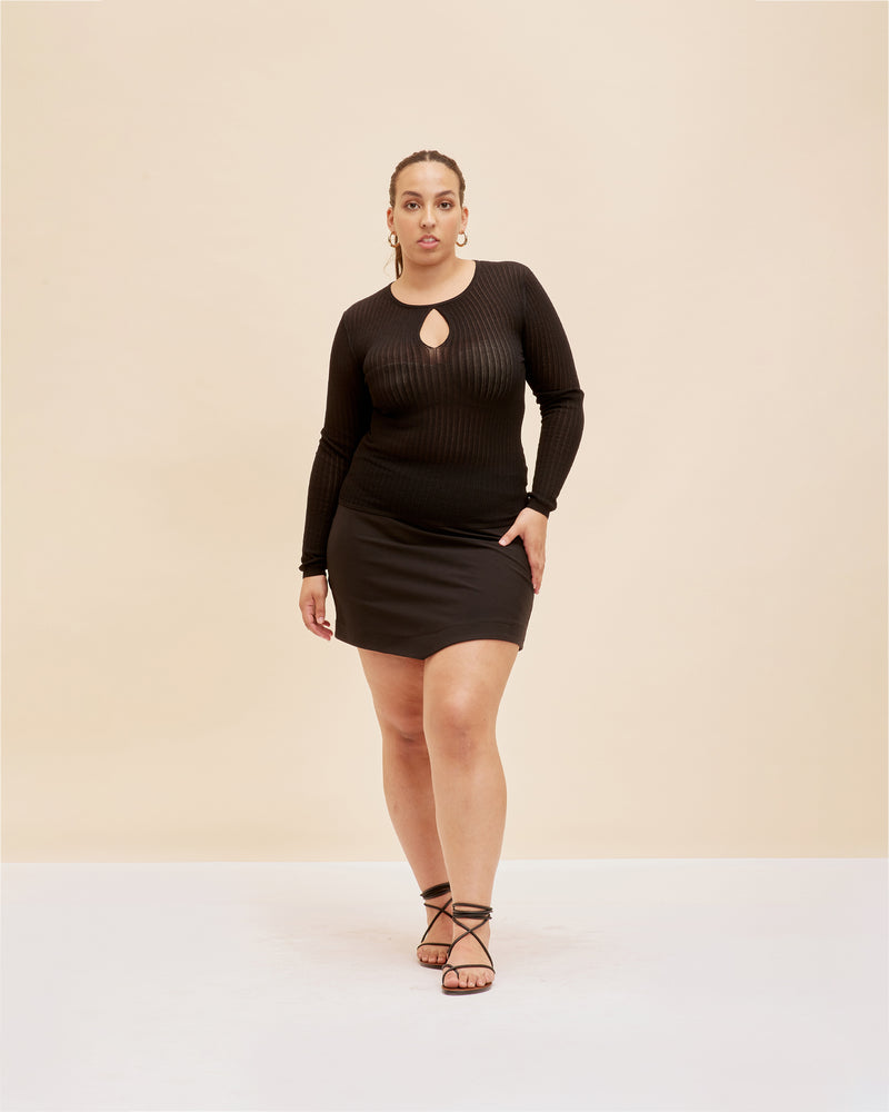 WREN KNIT LONG SLEEVE BLACK | An elevated take on a staple black rib knit. This semi-sheer long sleeve features a keyhole detail that takes this piece from simple to sleek.