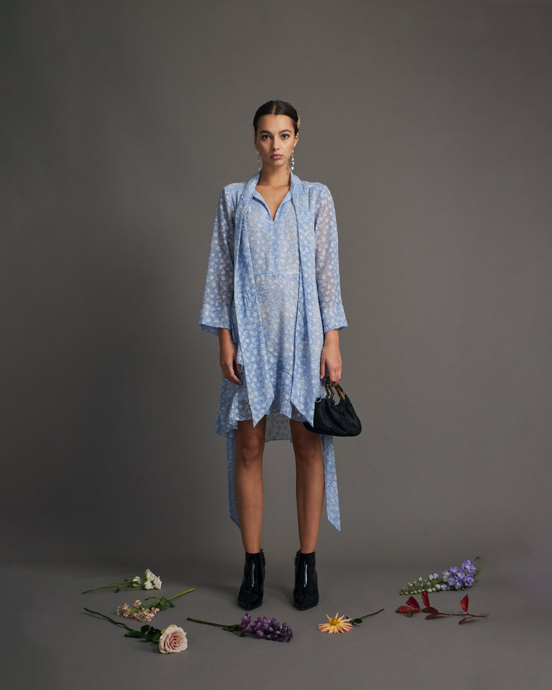 ZINNEA RUFFLE DRESS BLUE FLORAL TBF00028 | This piece is second hand and therefore may have visible signs of wear. But rest assured, our team has carefully reviewed this piece to ensure it is fully functional &...