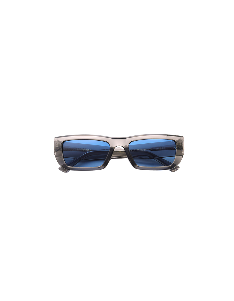 FAME SUNGLASS GREY | The Fame by A.Kjaerbede is an 80's inspired narrow frame sunglass with blue square lenses and contrasting grey frames.