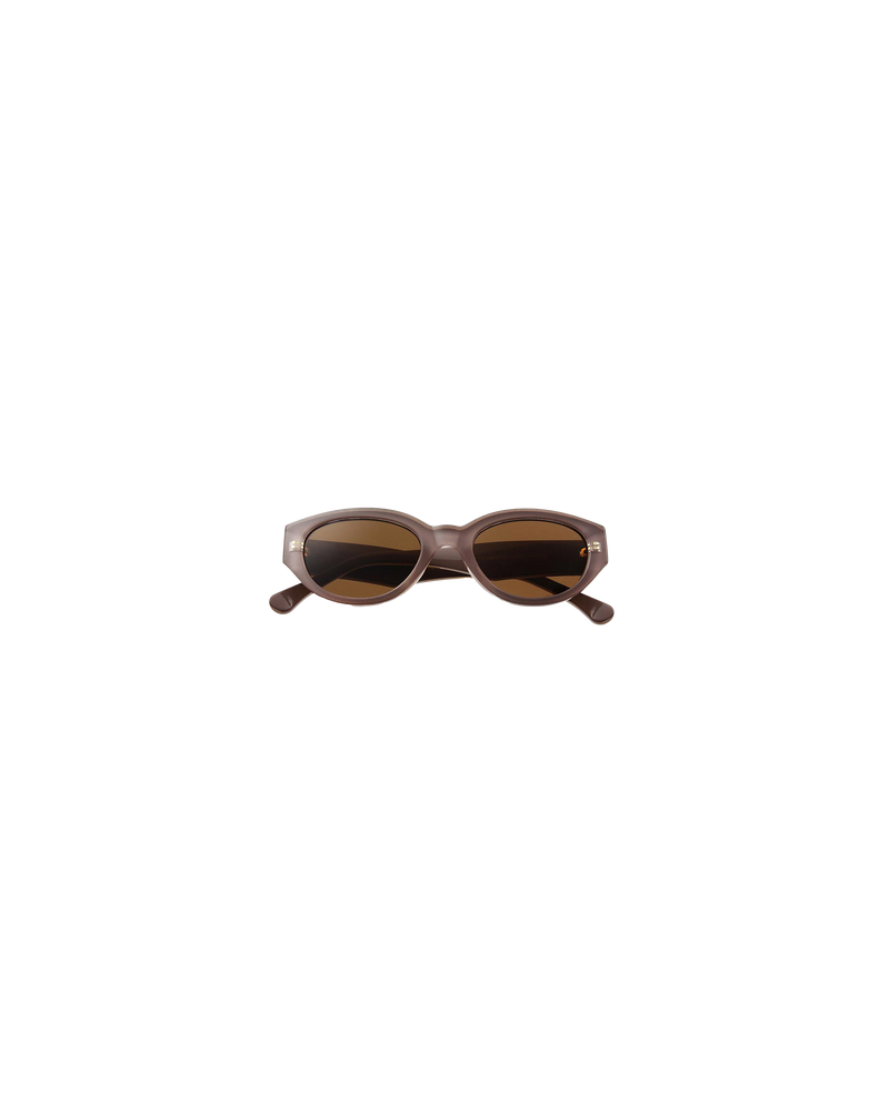 WINNIE SUNGLASS LIGHT GREY | The Winnie by A.Kjaerbede is a futuristic cat eye sunglass with grey frames and brown tinted lenses.