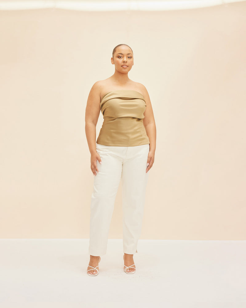 CHER SATIN BODICE PEAR | Strapless bodice with pleated detail down the front, crafted in an pear coloured satin that adds to the structure of the piece. This piece is darted and slightly fluted at the hem to highlight...