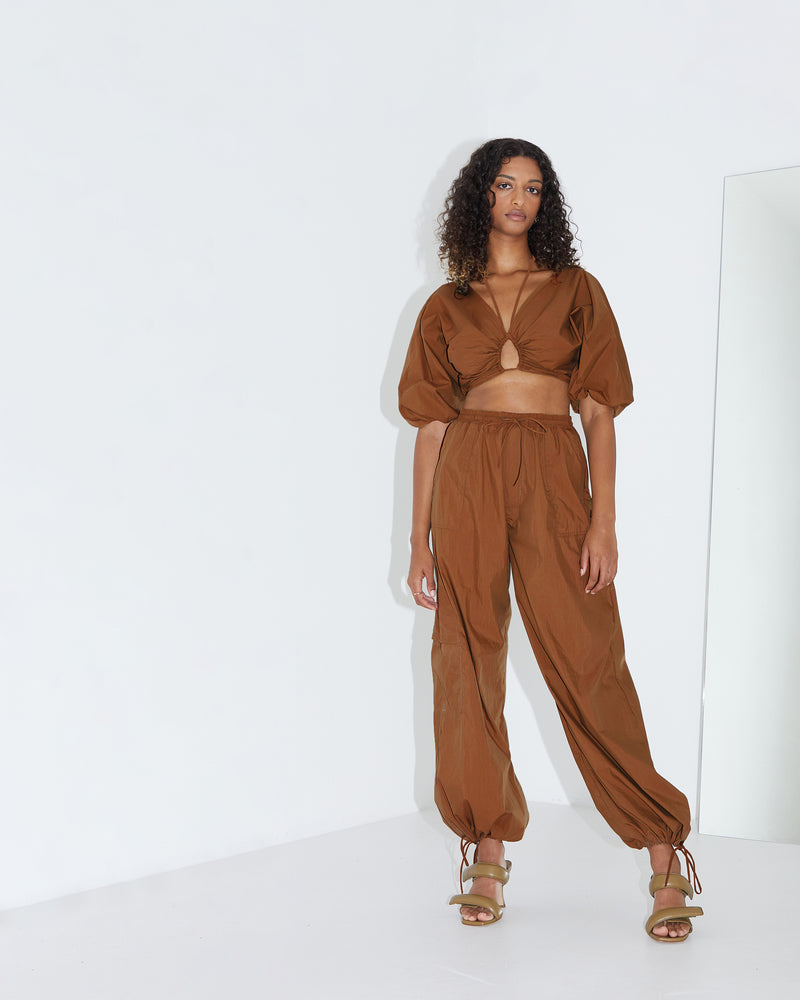 DONOVAN TIE CROP TOP MOCHA | Cropped cotton blouse with short batwing sleeves and keyhole opening with a tie detail at the centre neckline. The tie can be used to cinch in your waist and can...