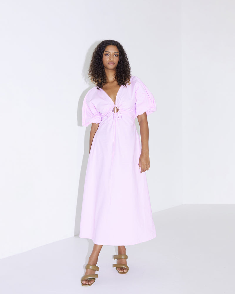 DONOVAN TIE DRESS PINK | Cotton A-line midi dress with short batwing sleeves and keyhole opening with a tie detail at the centre neckline. The tie can be used to cinch in your waist, the...