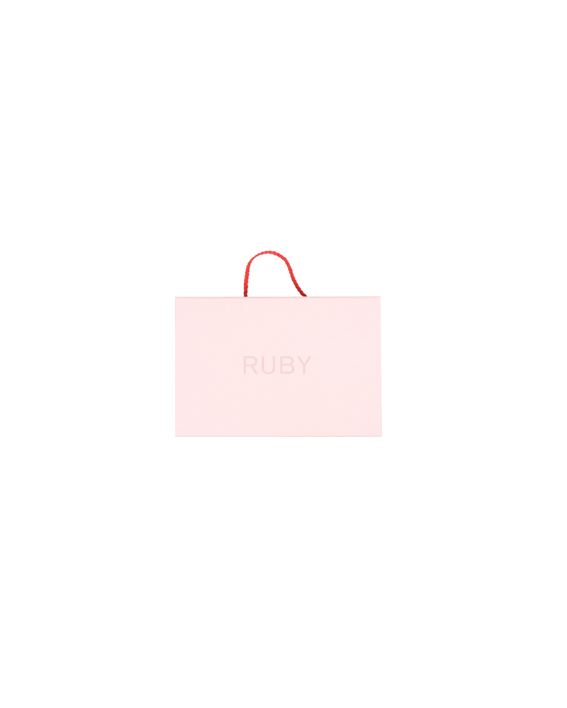 GIFT BOX PINK | The RUBY Gift Box is a collapsible box for gifting. It features top flap with magnetic snap closure; and a cut-out for threading through the box strap. The box handle is a...