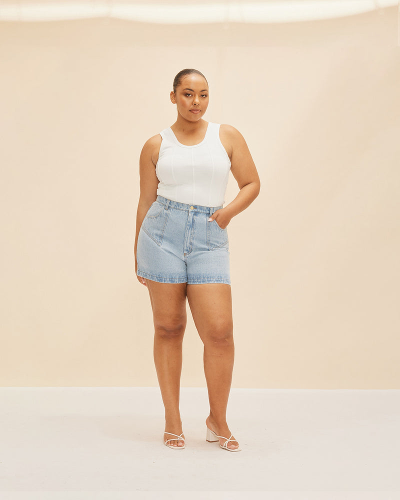 CLOVER DENIM SHORT BLUE | Our classic highwaisted denim short in blue, made in a soft washed denim, ready for easy strides and warm weather. It isn't a Rubette summer without the Clover Denim Short.
