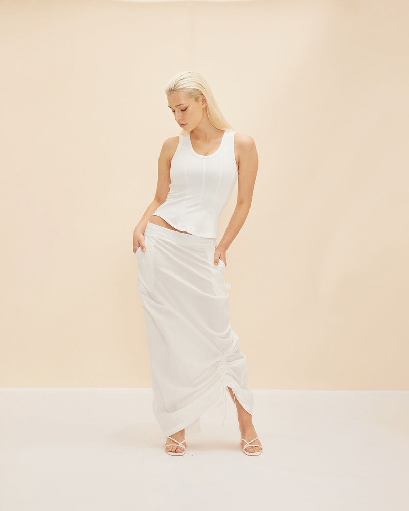 DONOVAN TIE SKIRT WHITE | Cargo style skirt with an asymmetrical drawstring that runs through the skirt giving you mutliple ways to play with styling. This skirt is designed to sit mid waist and has a...