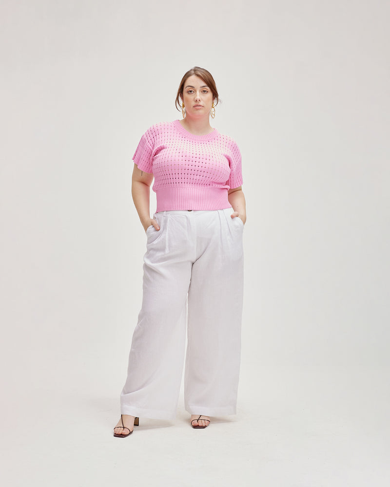 KATA TOP PINK | Lattice knit short sleeve top with ribbed hem detailing in a vibrant pink colour. The knit detailing adds a point of interest to this staple piece.