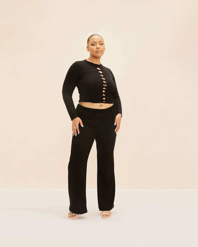 FIREBIRD SUIT PANT BLACK | Highwaisted crepe pant with a slim leg silhouette. These pants take the classic elements of the wide-leg Firebirds that Rubettes know and love but are perfectly tailored to a slimmer...