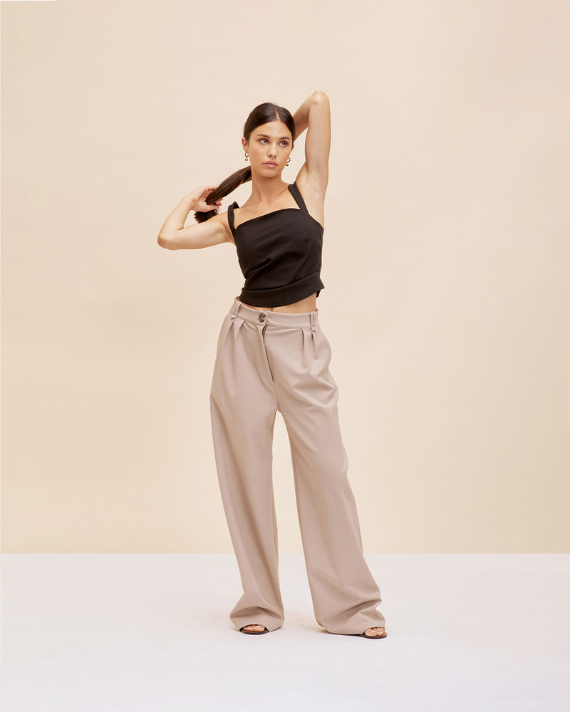 SATURN TROUSER OATMEAL | High waisted, relaxed suit trouser cut in a fresh oat coloured suiting. Beautifully tailored pants with neatly pressed pleats that highlight the shape.